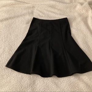 Knee length black skirt